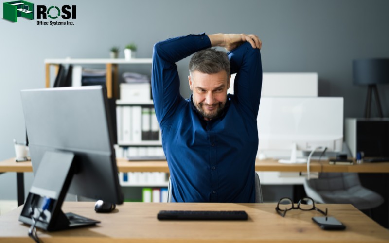 A man exercising at office