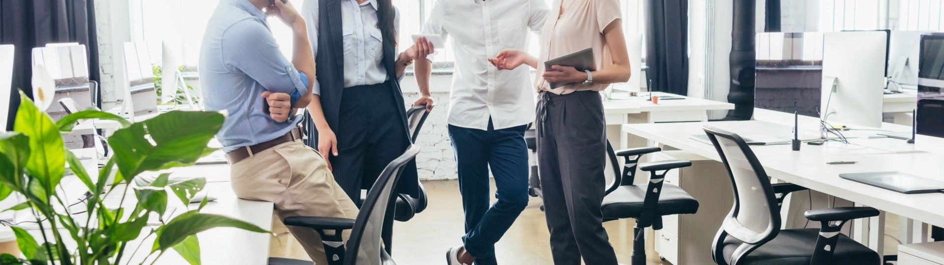 young attractive business associates in casual work attire