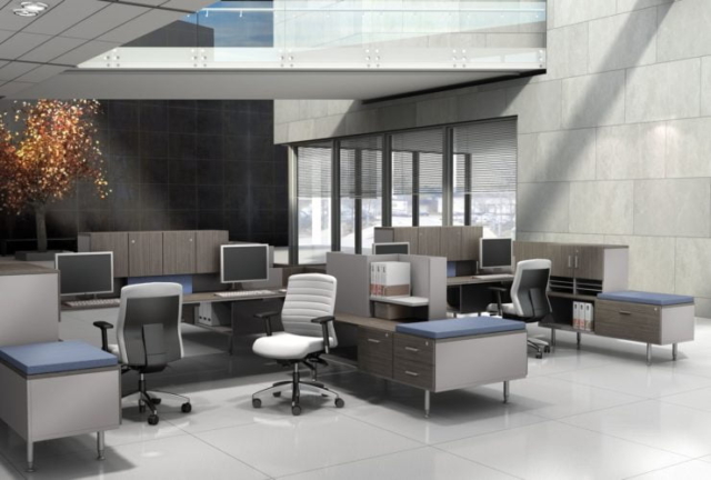 Studio photography of Global's 4-person sidebar benching in a reception area. The tops are given a grey wood finish, and blue topped credenzas are placed at the sides.