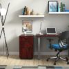 Studio shot of OTG's Home Office Setup, which has a 24" x 48" work table placed in the corner by the window. At the left is a set of pedestal drawers. The third (top) drawer has a lock on it. Both the desk and pedestal drawers are finished in an _____. A simple mesh-back office chair is pulled up to the laptop, with a LED lamp next to it.