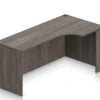 Orthographic view of an Offices to Go 71 inch credenza, with corner extension. It has an Artisan Grey laminate finish.